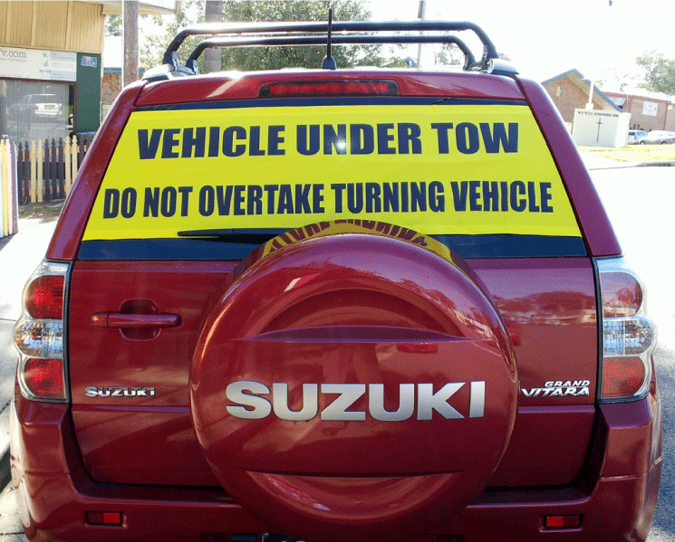 Vitara Vehicle Under Tow Sign
